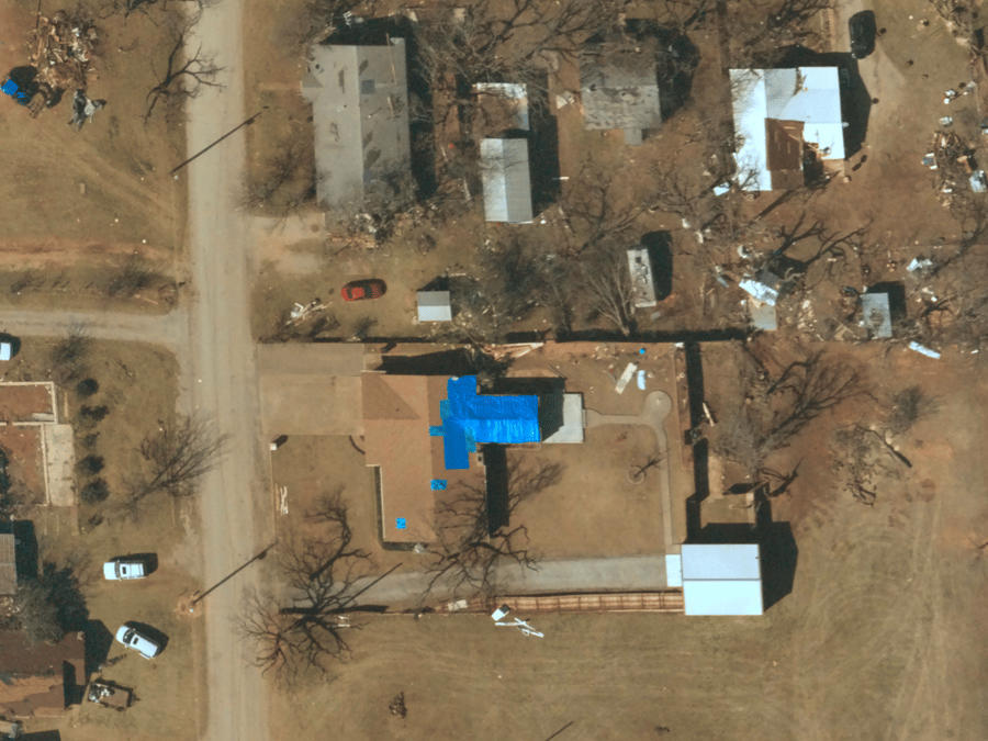 Near Space Labs 10 cm post-catastrophe capture of houses with roofing damage after tornado. 